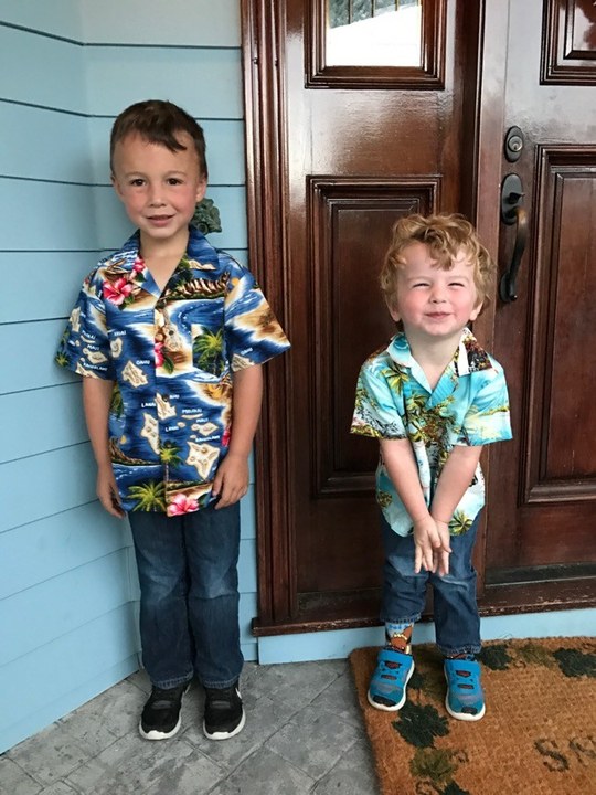 Young Dexter and Oliver in matching Hawaiian shirts